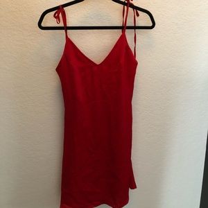 Criss-cross backless knotted satin slip dress